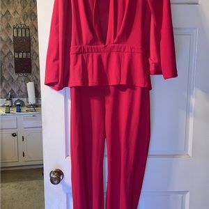 Pink jumpsuit with built in blazer low cut front very stylish